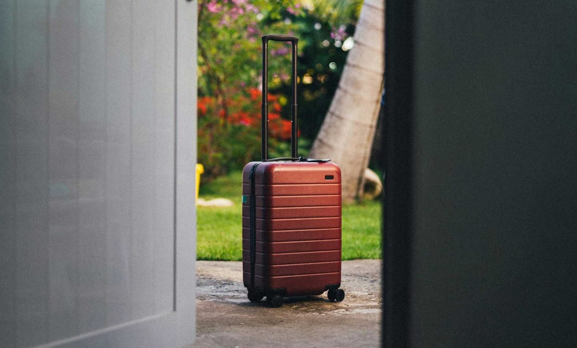 suitcase sitting at the door